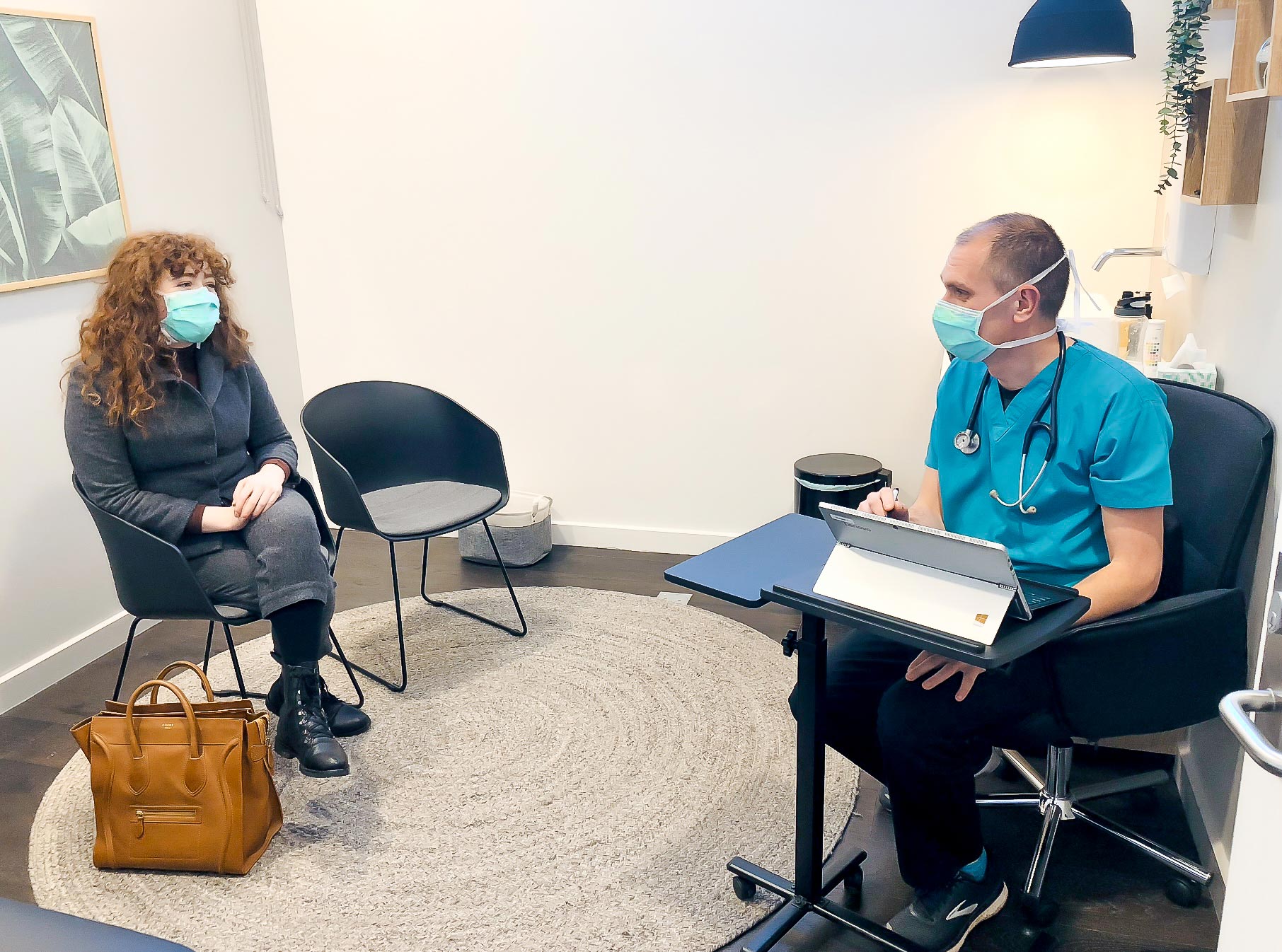 patient and doctor sitting in an appointment discussing chronic disease management